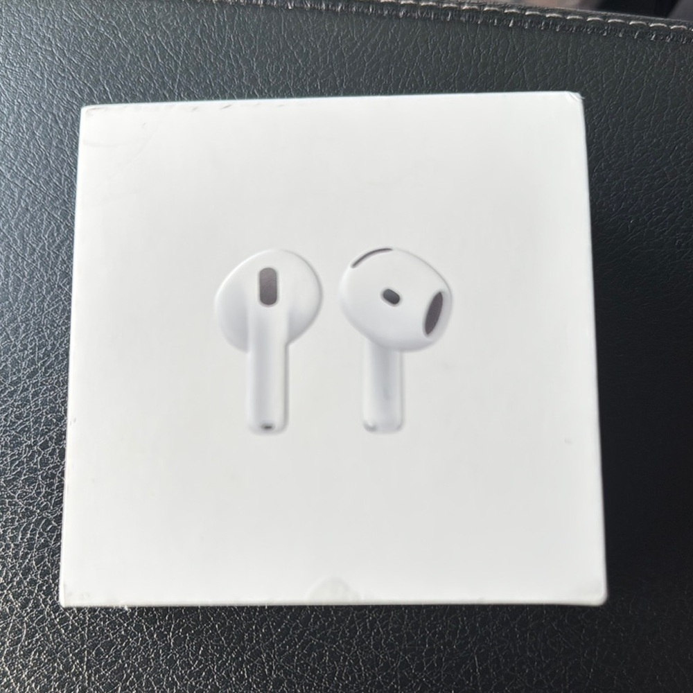 Apple AirPods 4 White with Purple Hard Case. Used 2 times. With Charging case.